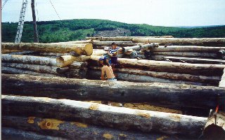 Showing the construction of the log house